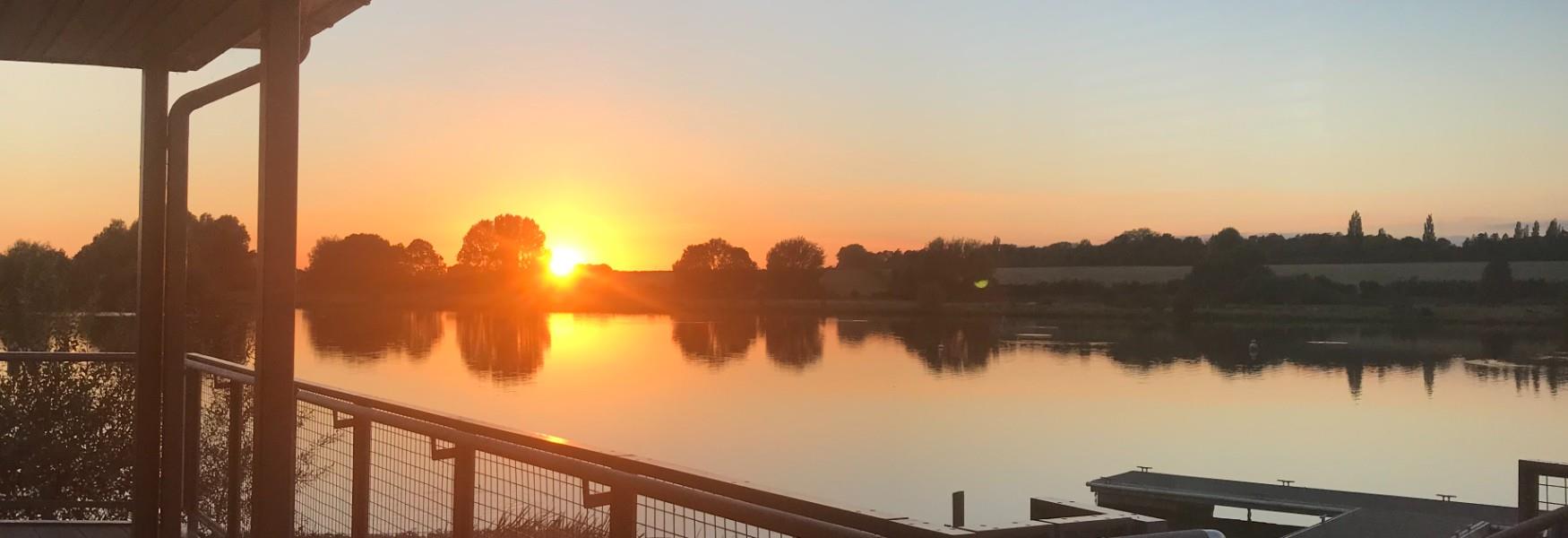View of the sunset at Ferry Meadows