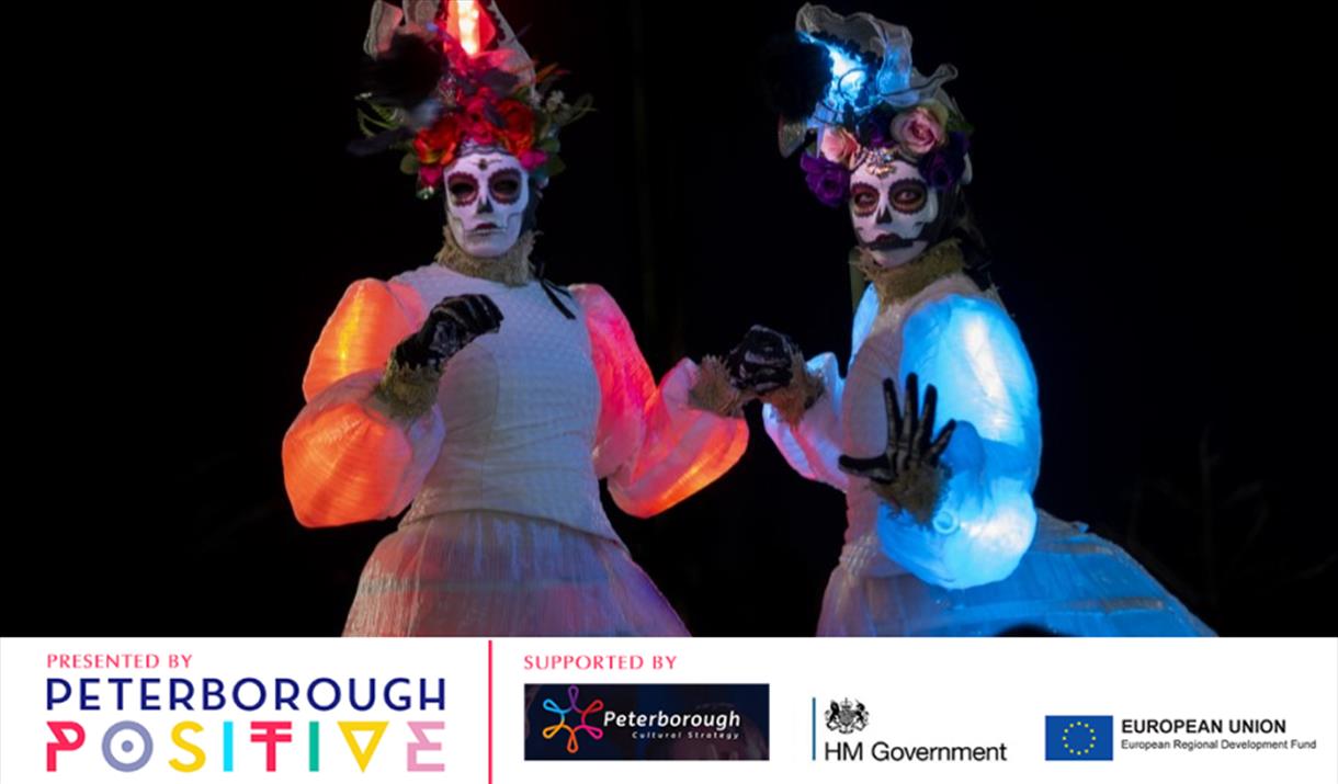 The illuminated Las Muertas stiltwalkers