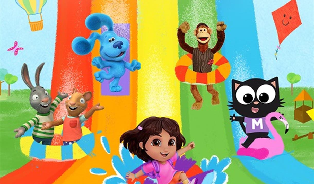 A variety of Milkshake characters, such as Dora the Explorer and Smurfette, sliding down a rainbow. Text reads 'Milkshake live! Milkshake on holiday.'