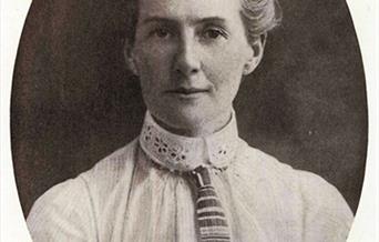 A black and white photograph of Edith Cavell.