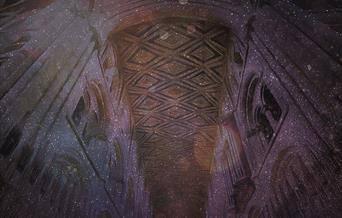 Peterborough Cathedral lit by galaxy lights