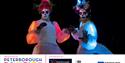 The illuminated Las Muertas stiltwalkers