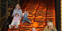 Family going down a slide at Safari Play!