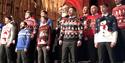 Choir in Christmas Jumpers Singing.