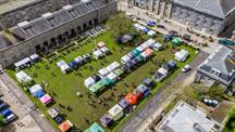 Aerial view of The Green at Royal William Yard with stalls