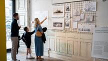 People looking at exhibition in the Royal William Yard 