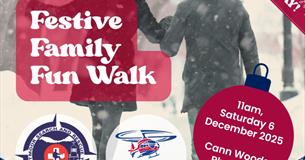 Family walks at Christmas time with the words FAMILY FESTIVE FUN WALK over the top