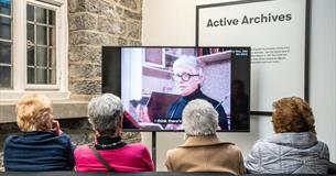 Picture of women watching an archive talk