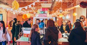 Visitors at Design to Sell, the annual makers market at Arts University Plymouth's Pre-Degree campus