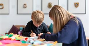two kids on craft table