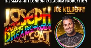 Joe McElderry as Pharaoh. Black backdrop with gold and rainbow 'Joseph and the Amazing Technicolor Dreamcoat.