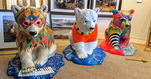 Dressed up polar bear statues