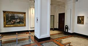 Paintings on display in a gallery at The Box Plymouth
