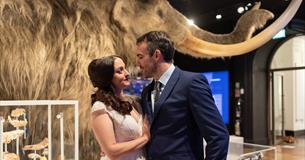 Photograph showing a bride and groom in the Mammoth Gallery at The Box
