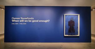 Photograph showing the introduction to an exhibition