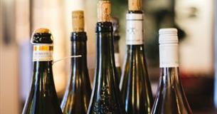 6 corked vintage prosseco bottles