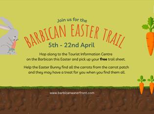 EGGStraordinary Barbican Easter Trail on the barbican. A cartoon chick in the grass with a bee floating above it.