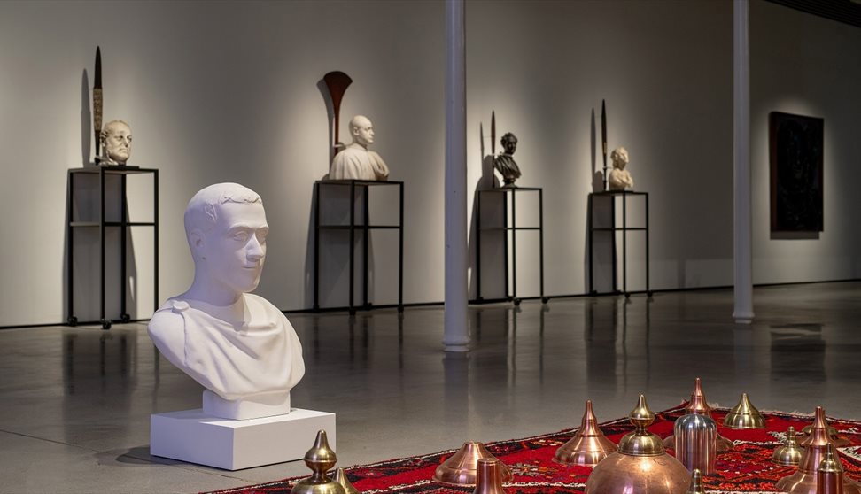 Photograph of a contemporary art installation, featuring sculptures.