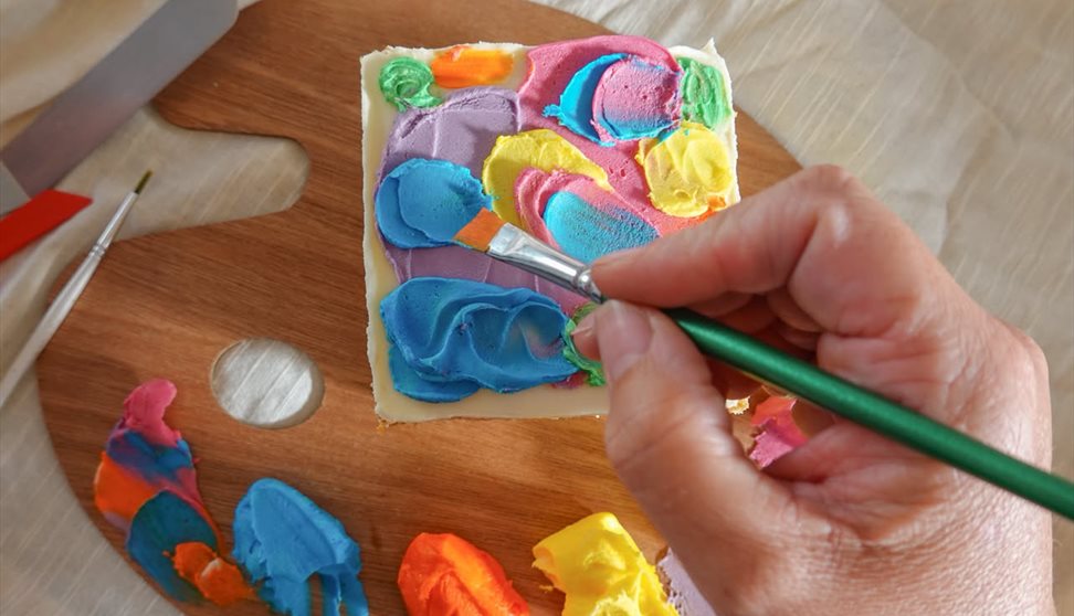 cake decorating with colourful icing