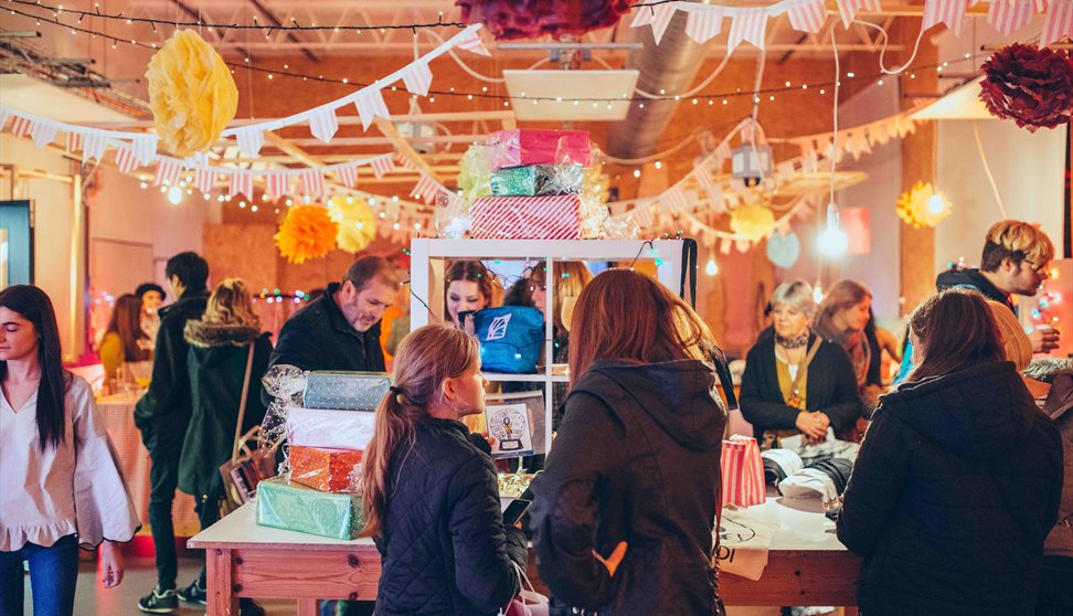 Visitors at Design to Sell, the annual makers market at Arts University Plymouth's Pre-Degree campus