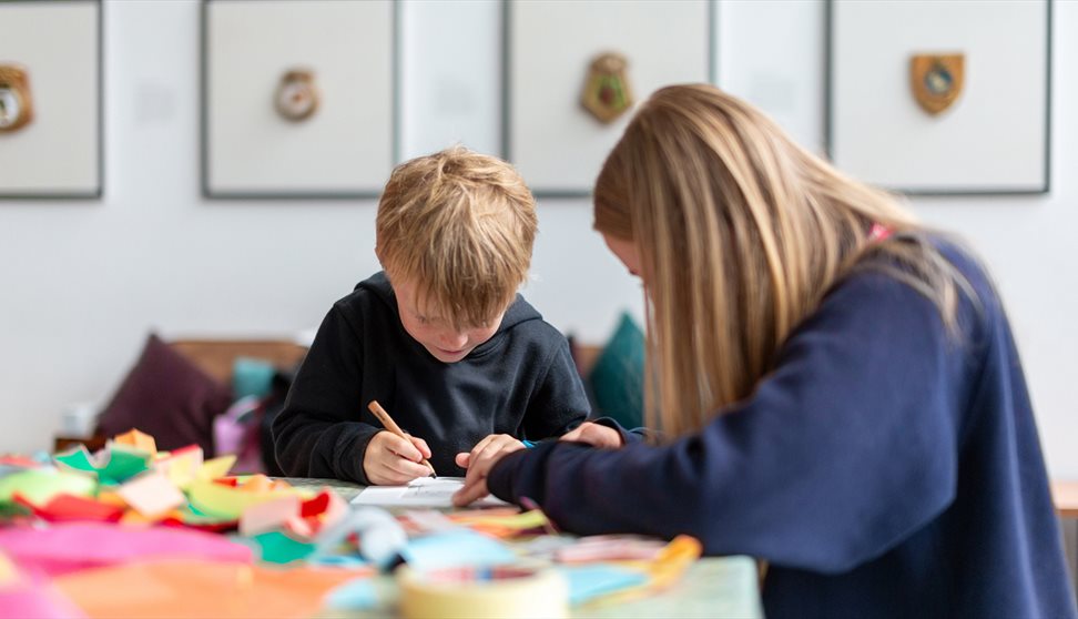 two kids on craft table
