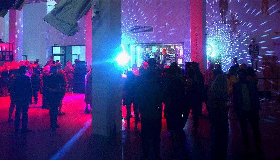 people inside the box building