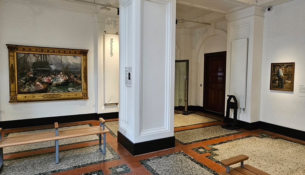 Paintings on display in a gallery at The Box Plymouth