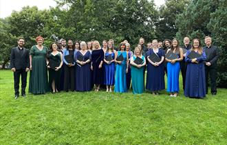 Choir members dressed in formal wear