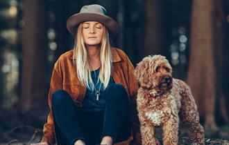 alex hart sitting with the dog