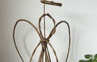 An angel figure made from willow