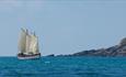 Boat sailing across Plymouth sound