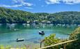 Boats floating in an azure body of water