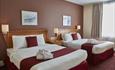 Twin bedroom at Future Inn Plymouth with two spacious Canadian queen size beds