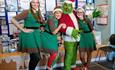 The Grinch with his elves at the Plymouth Tourist Information Centre at the Barbican Christmas Lights switch on
