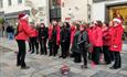 Singing group at the Barbican Christmas Lights switch on in Plymouth