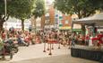 West End Carnival performer and crowd