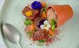 A sumptuous dessert creation at the Box Kitchen & Bar including edible flowers.