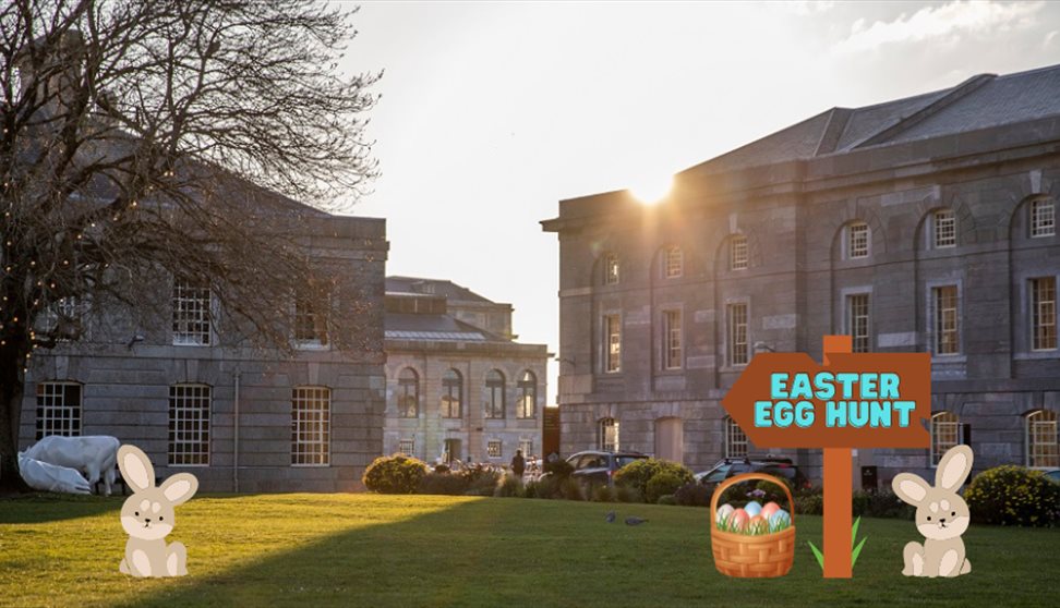Royal William Yard Lawn with Easter bunnies and a sign saying Easter Egg hunt