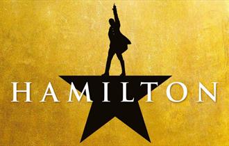 Image title of Hamilton in gold and black