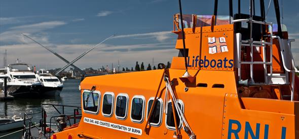 Orange RNLI boat in the sea