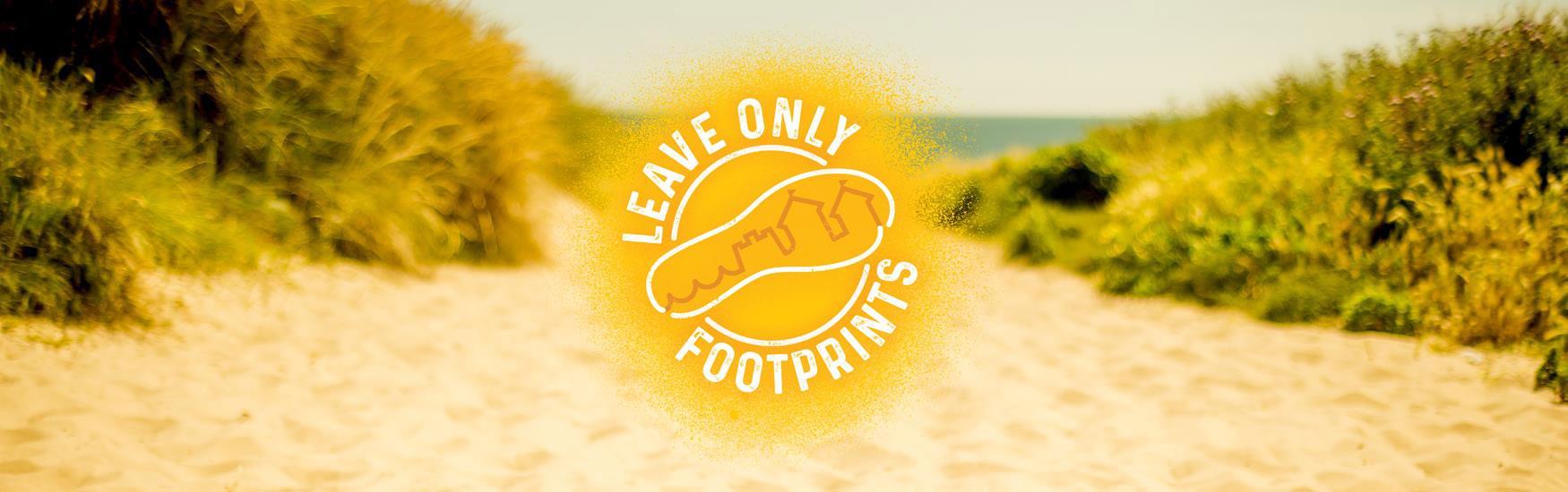 Leave only footprints logo with stunning beach in background