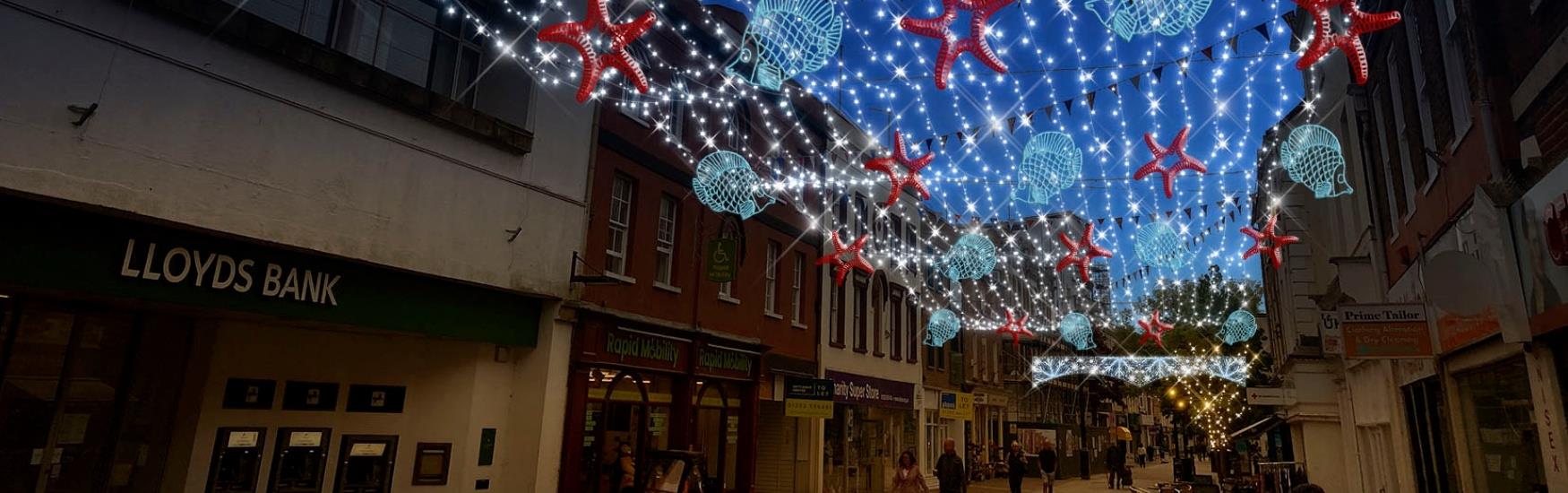 Overhead sea related Christmas lights on Poole Highstreet