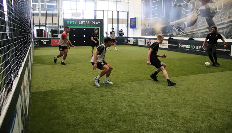 Men playing 5 a side football at FTY Lab