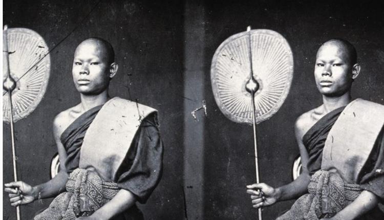 an old photograph taken by John Thompson of two young guys