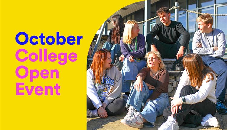 A group of seven college students sitting on the steps laughing and talking.