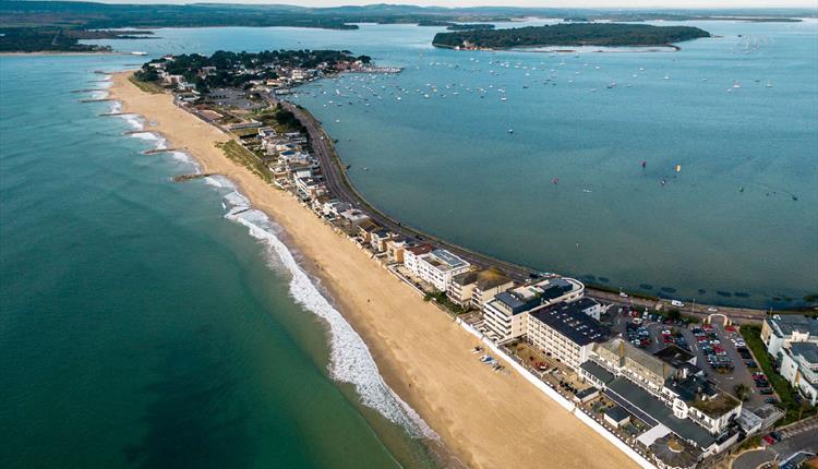 Beautiful birds eye view of a stretch of Sandbanks beach on a clear summers day in Poole