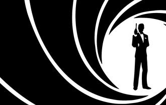 Black and white silhouette of James Bond as seen in the opening titles.