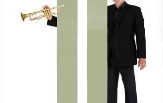 Image of BSO Musician, holding a trumpet