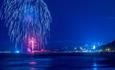 A deep blue firework lights up the skies over Bournemouth Pier