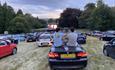 Friends sitting in their cars watching movies
